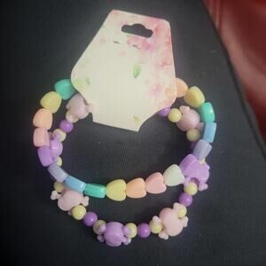 Skull crossbones arm kandi pastel rainbow beaded bracelets
